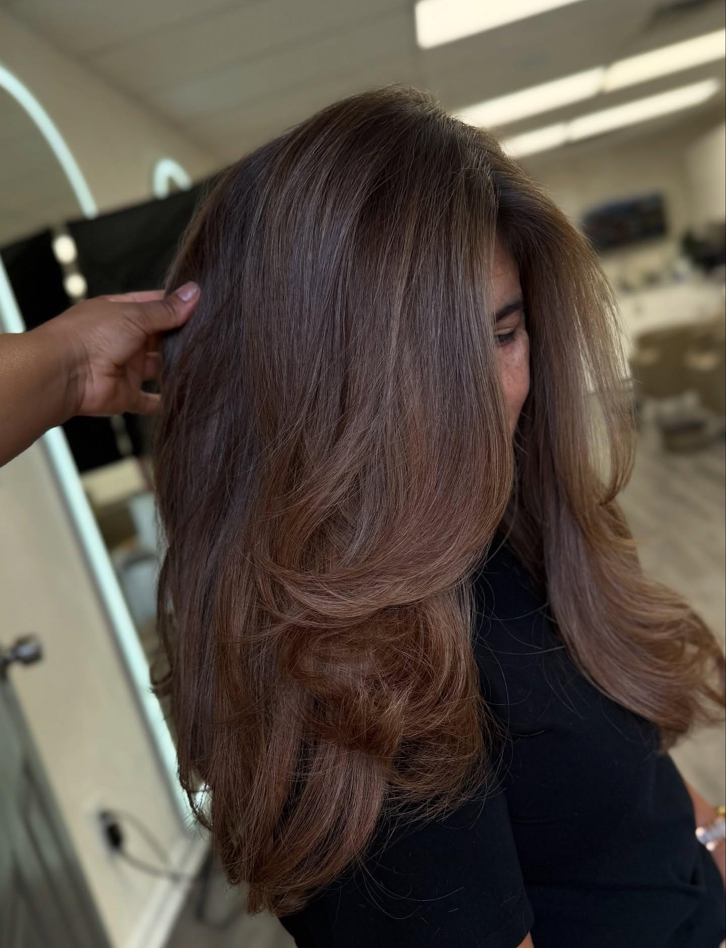 A finished hand-tied extension install at Crown and Mane