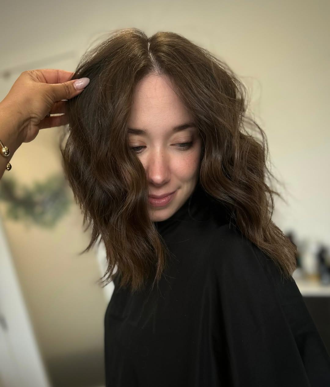 A soft, wavy lob cut with movement through the mid-lengths